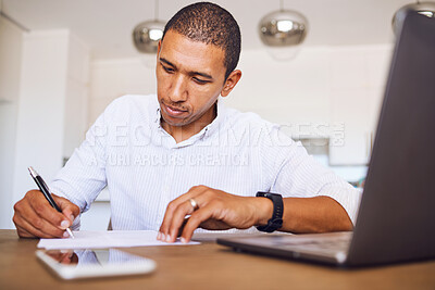 Buy stock photo Man, paper and desk writing in planning, accounting or signing contract in home. Notebook, businessman and with a report, budget or finance on laptop, phone and page for business, goal or strategy