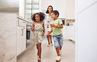 Buy stock photo Mother, kids play together running game and family bonding in kitchen at home. Smiling playful mother, happy excited energetic children and actively enjoying fun leisure indoor activity with mom