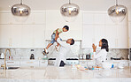 Mother, father and child baking or cooking as a happy family in a house kitchen with mom and dad having fun with boy. Love, learning and parents teaching young son development skills and to bake cake