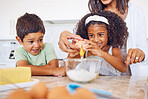 Cooking, food and children with a girl and boy baking or learning in the kitchen of their home together with mom. Kids, egg and bake with a mother teaching a brother and sister how to make cake mix