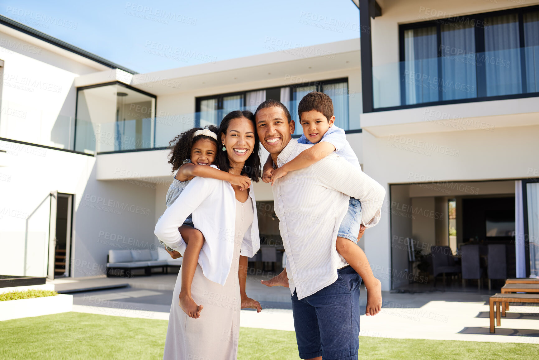 Buy stock photo Family, happy and new home in summer at property, mortgage and mansion backyard. Parents, children and smile for piggyback on grass at luxury, real estate or house together for happiness in Atlanta