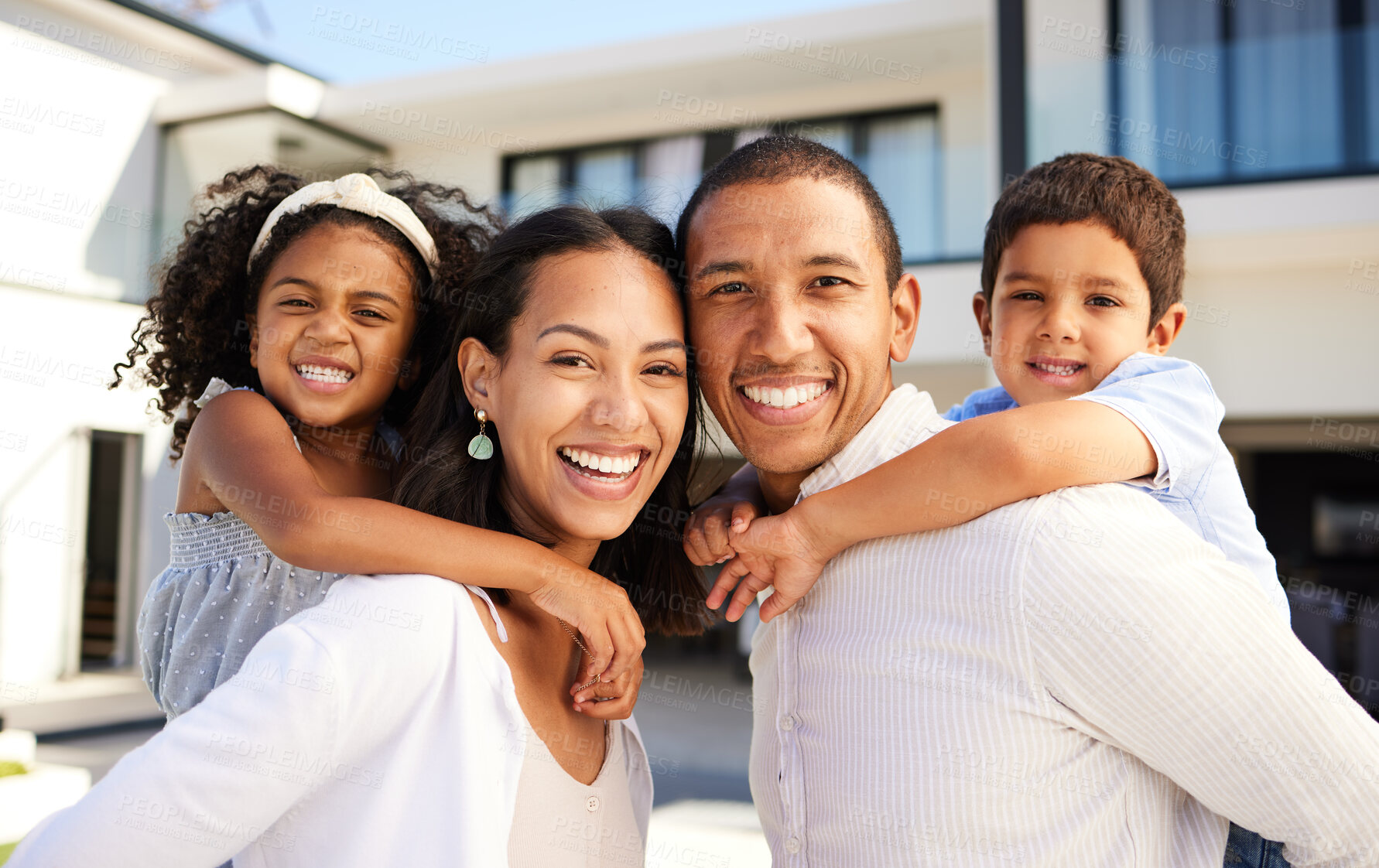 Buy stock photo Love, smile and portrait of a happy family in the backyard of their modern home with a piggyback ride. Happiness, parents and children bonding, playing and quality time together outdoor at the house.