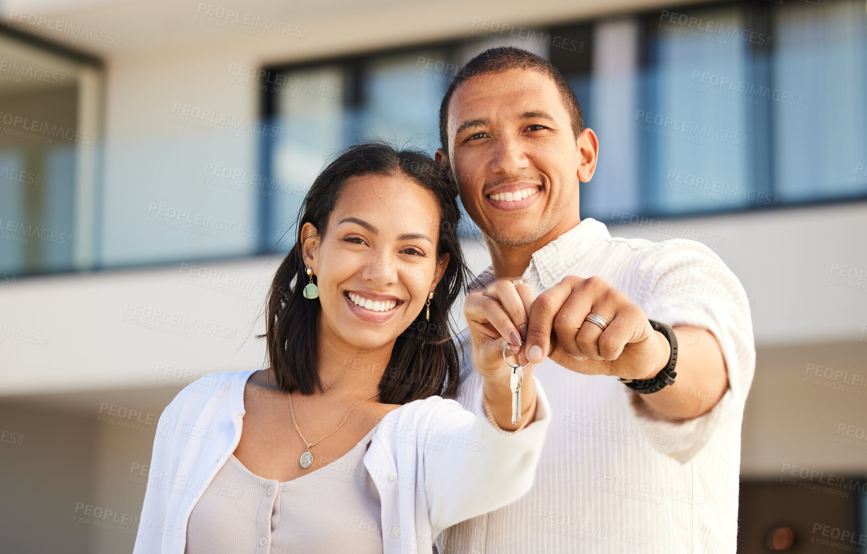 Buy stock photo Happy couple, portrait and holding keys to house with smile for relationship goals and marriage together. Excited man and woman homeowners smiling with key moving in for real estate and new home