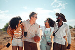 Friends, funny and nature with a man and woman group walking in nature on a sad road through the dessert. Travel, laughing and freedom with young people on holiday or summer vacation together