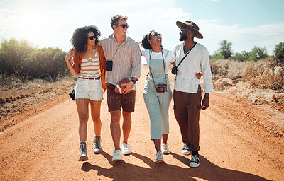 Buy stock photo Safari, funny and friends walking in nature during a holiday together in summer. Comic, happy and young group of people on travel vacation in the desert for freedom, adventure and happiness in Kenya