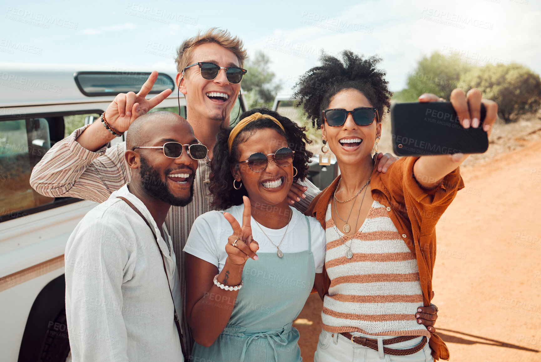 Buy stock photo Diversity, selfie and friends on road trip adventure in a countryside taking a picture on phone. Travel, holiday and group of people with smartphone, car and smile on faces, happy on nature vacation