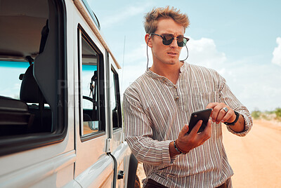 Buy stock photo Phone, map and gps with a lost man on the search for directions using 5g mobile technology during a road trip. Travel, breakdown and roadside assistance with a young male traveler in the dessert