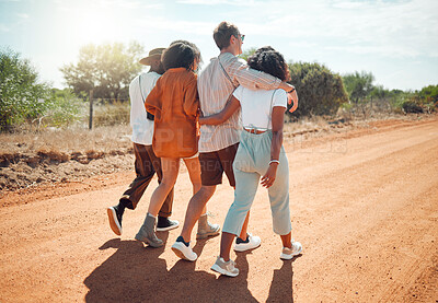 Buy stock photo Friends, hug and travel in the countryside for summer vacation walking together on a desert road in nature. People in friendship support, care and love hugging in the safari for holiday walk or trip