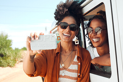 Buy stock photo Selfie, smile and friends on a road trip with a car during a safari holiday in Kenya. African women with phone for photo, communication and social media live streaming on vacation in the desert