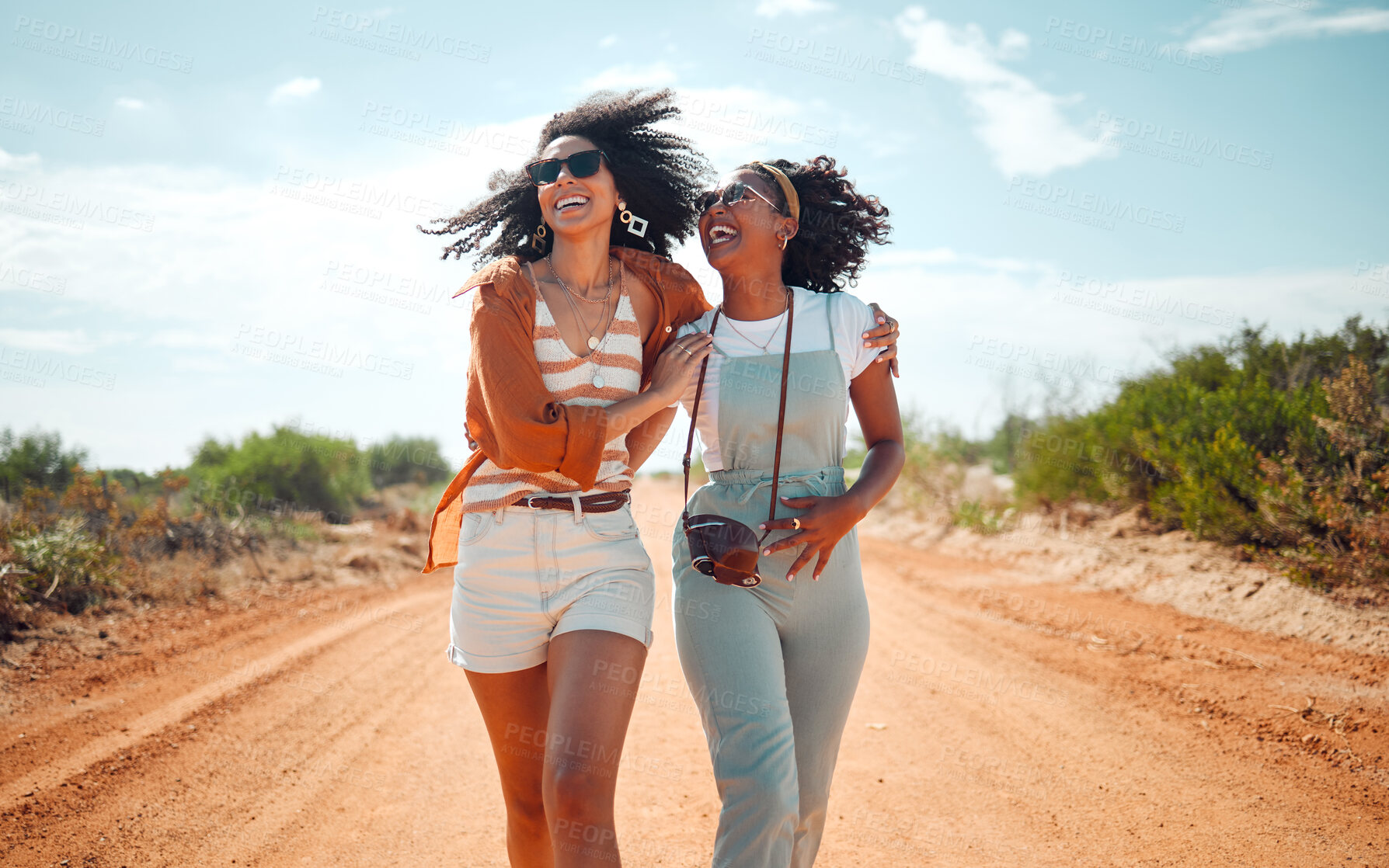 Buy stock photo Walking, happy and friends on holiday at a safari during summer together in nature of Kenya. Happy, playful and young African women on vacation in the desert for travel, freedom and adventure