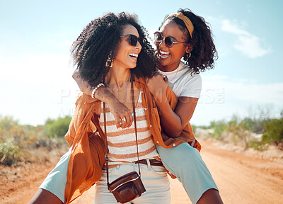 Buy stock photo Piggyback, smile and friends on safari holiday during summer in Kenya together. Comic, funny and young black women walking on a happy adventure in the desert during outdoor vacation in nature