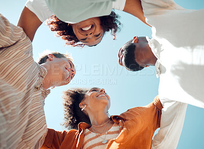 Buy stock photo Huddle, happy and friends with support, love and smile in summer against blue sky. Diversity in group of people in solidarity, trust and happiness with hug, comedy and faith in circle from below