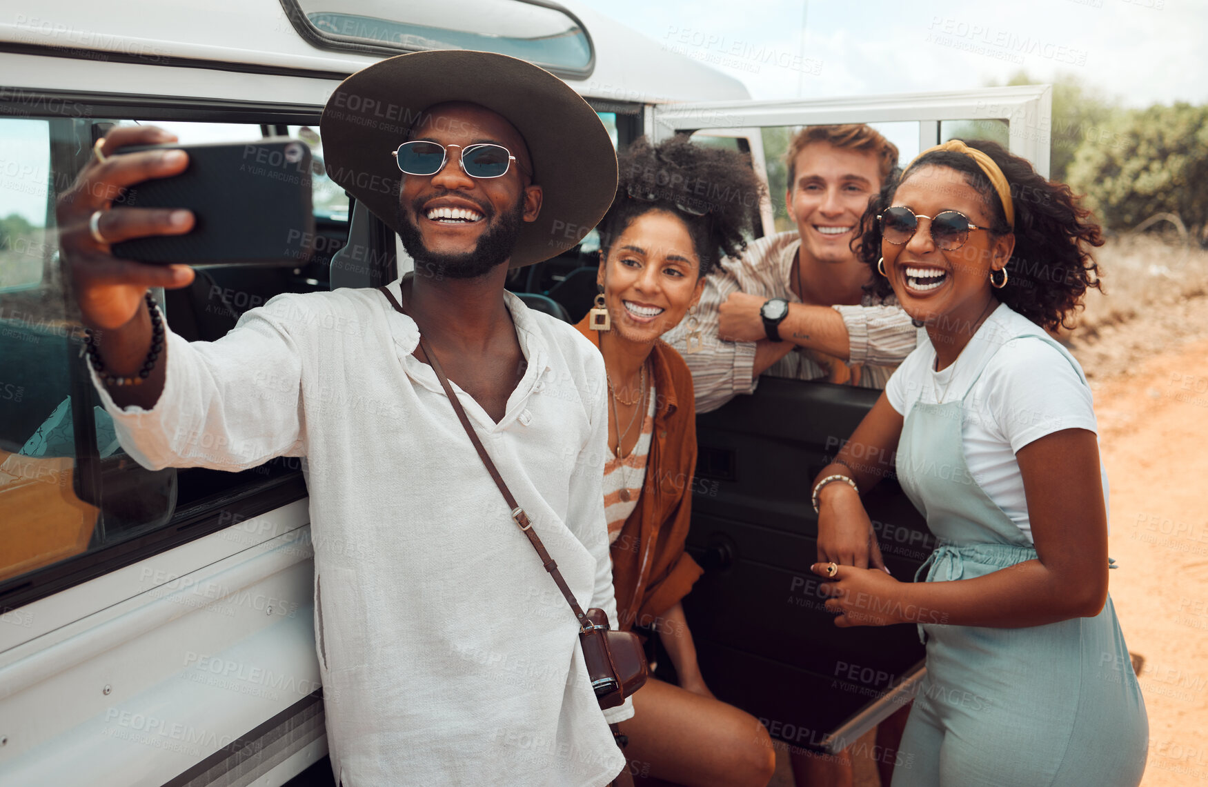 Buy stock photo Happy, friends and smile for selfie in travel for summer vacation and road trip together in the desert. Group of people traveling and smiling in happiness for photo with smartphone in nature safari