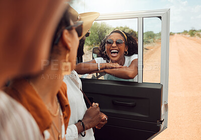 Buy stock photo Friends, safari and a holiday adventure in nature for black woman in African outdoor game reserve. Diversity, travel and happy road trip, men and women on gravel road sightseeing in bush in Africa.