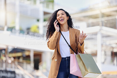 Buy stock photo Happy woman, shopping and phone call in the mall in communication about lifestyle in the outdoors. Female shopper having conversation with smile and laugh on mobile smartphone in the city market