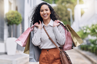Buy stock photo Shopping, retail and city with a black woman customer on the search for a sale, bargain or deal. Money, consumer and shopper with young female at an outdoor store or mall for buying and spending