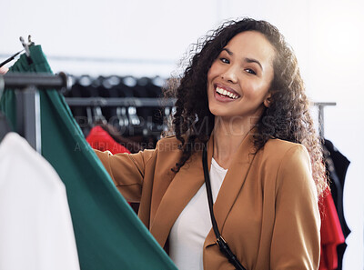 Buy stock photo Woman customer, in clothes shop and happy browse, look through clothing racks and smile. Consumer, fashion and female client shopping in store for items, being relax or in boutique for retail therapy