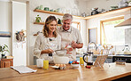 Couple, love and baking with a senior man and woman cooking in the kitchen of the retirement home together. Food, happy and bake with an elderly male and female pensioner preparing a meal in a house