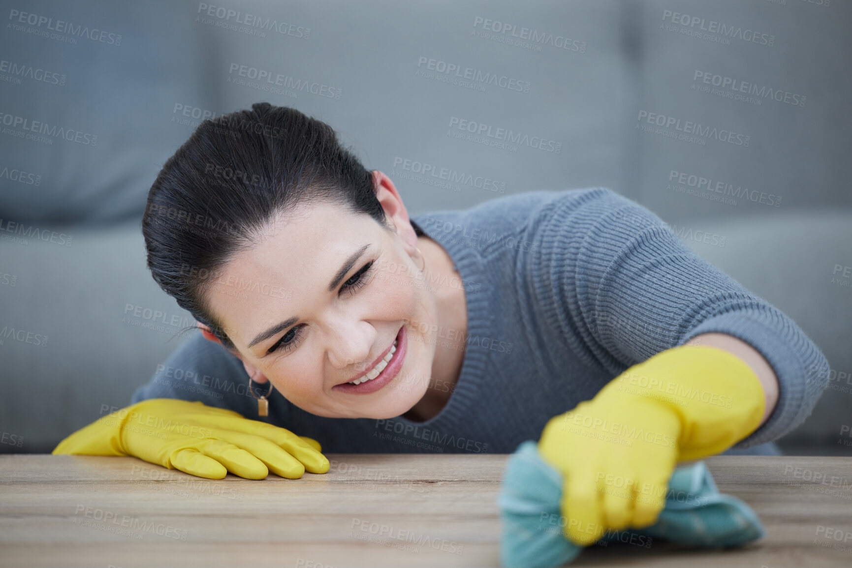 Buy stock photo Woman with gloves, cleaning the table in living room, hygiene and wipe stain on furniture. Wash, clean and girl doing domestic chores at home with cloth for dust, dirt and bacteria with rubber gloves