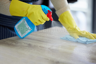 Buy stock photo Hands, gloves and spray cleaning table with disinfectant for clean house. Kitchen counter, home safety and disinfection with alcohol solution in bottle to protect home from germs, dust and bacteria.