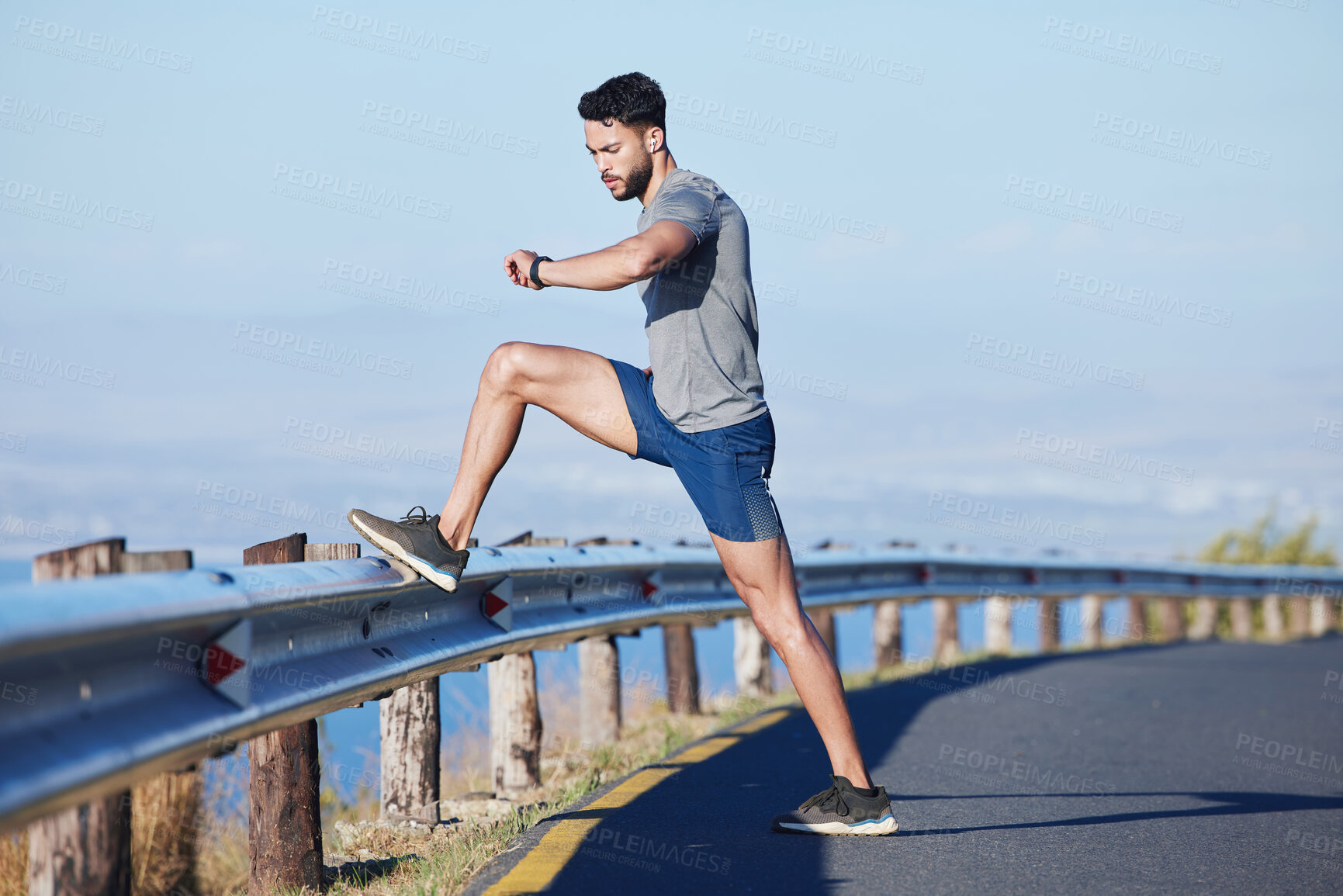 Buy stock photo Runner, road and man on time by smartwatch to start running, exercise and cardio workout to burn fat outdoors. Healthy, wellness and athlete monitoring training performance on his fitness journey