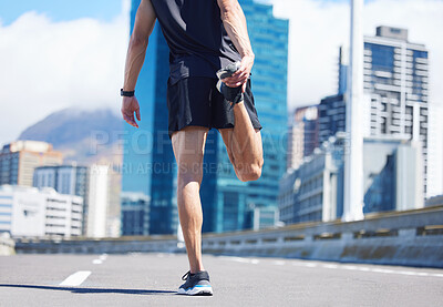 Buy stock photo Man, stretching legs and back view in city, street or urban road outdoors. Fitness, health and male athlete stretch or warm up before exercise, running or training outside for marathon run in town.