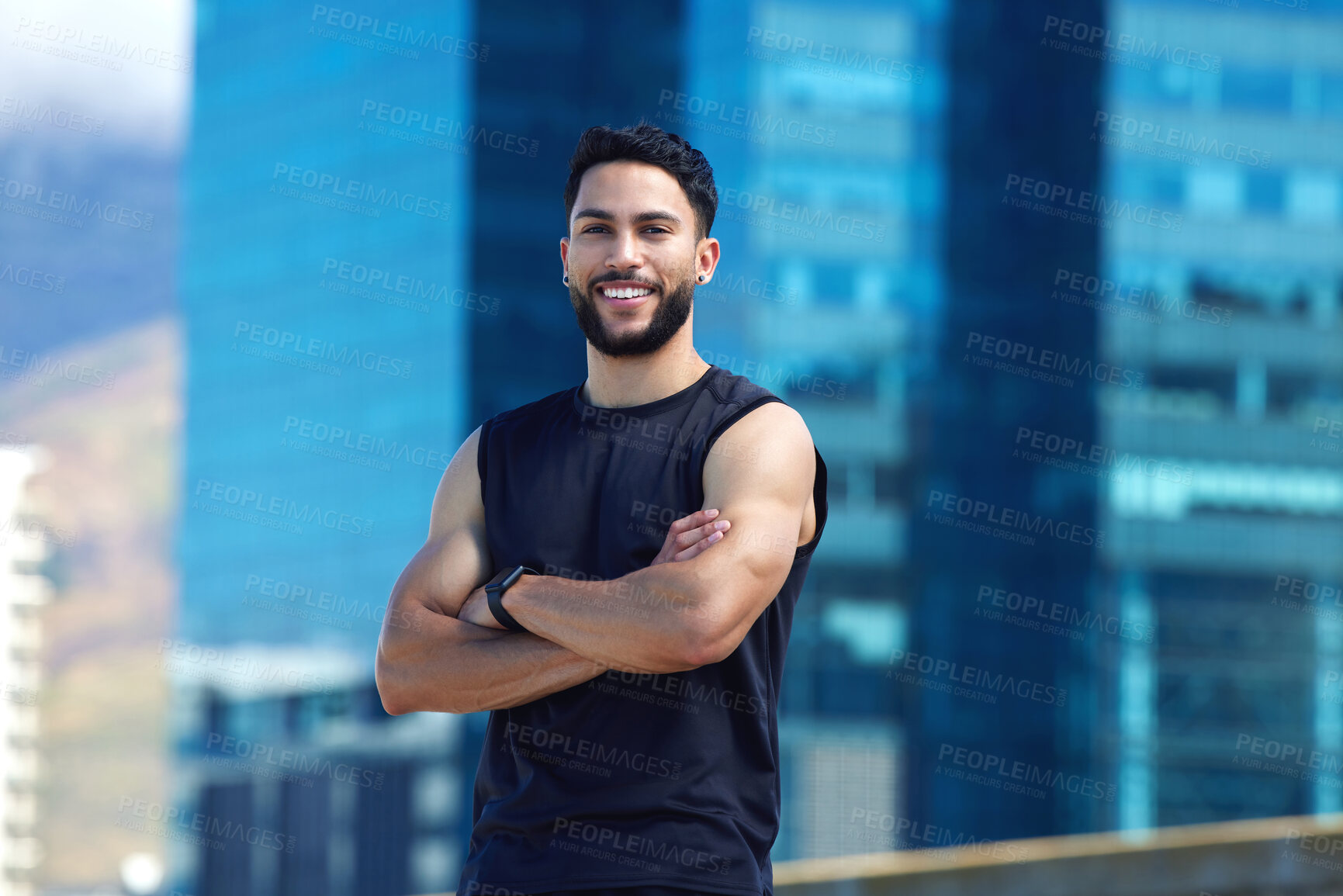 Buy stock photo Fitness, exercise and city with a sports man outside for health, wellness or a running workout. Training, sport and healthy with a male athlete standing arms crossed in an urban town alone