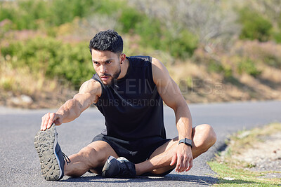 Runner, stretching and motivation for fitness, exercise and training on nature, park or sustainability environment road. Man, sports athlete and personal trainer ready for marathon running or workout
