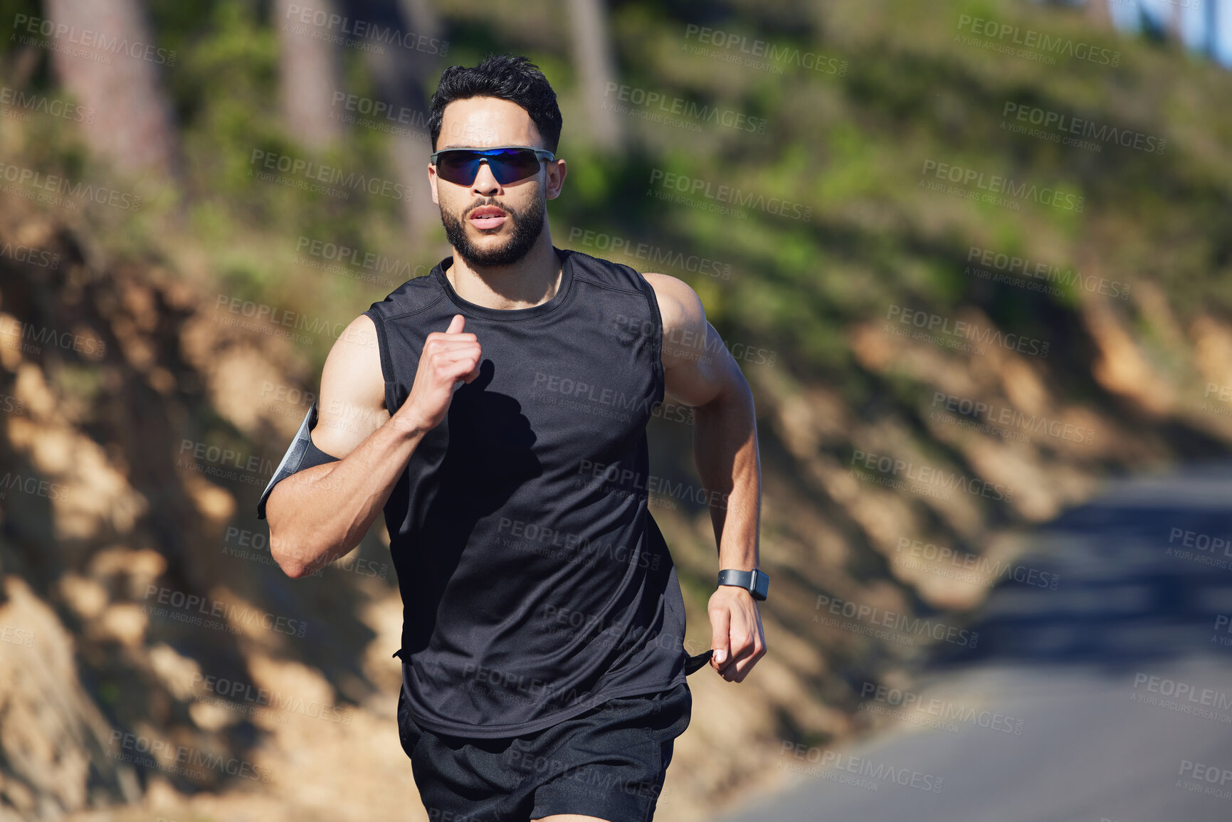 Buy stock photo Running, man and outdoor cardio fitness in nature for wellness, marathon training and healthy lifestyle in Dubai, UAE. Sports athlete, speed runner and morning exercise with sunglasses on summer road