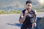 Training, fitness and man running on road wearing a watch, gear and sportswear. Male doing workout, run and exercise for marathon in the city. Motivation, inspiration and determination in sports 