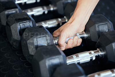 Buy stock photo Closeup, hand and gym for exercise with weightlifting, dumbbell and muscle development. Training, sports and workout at fitness center for health, wellness and physical strength in Los Angeles