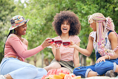 Buy stock photo Black woman, cocktail and friends relax on picnic for peace, wellness and friendship reunion with alcohol glass drink. Nature park, trees and happy gen z people bonding, having outdoor fun and smile