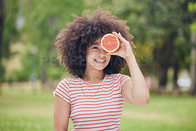 Buy stock photo Nature, smile and happy black woman with grapefruit for beauty or healthy body on outdoor day in garden park. Wellness, freedom and relax nutritionist girl with fruit, food or organic health product