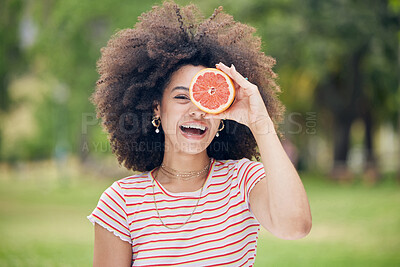 Buy stock photo Woman, happy and diet with grapefruit for healthy detox and face in a nature park in summer. Portrait of female vitamin c skincare and wellness with beauty keeps her fresh, wellness outdoor in summer