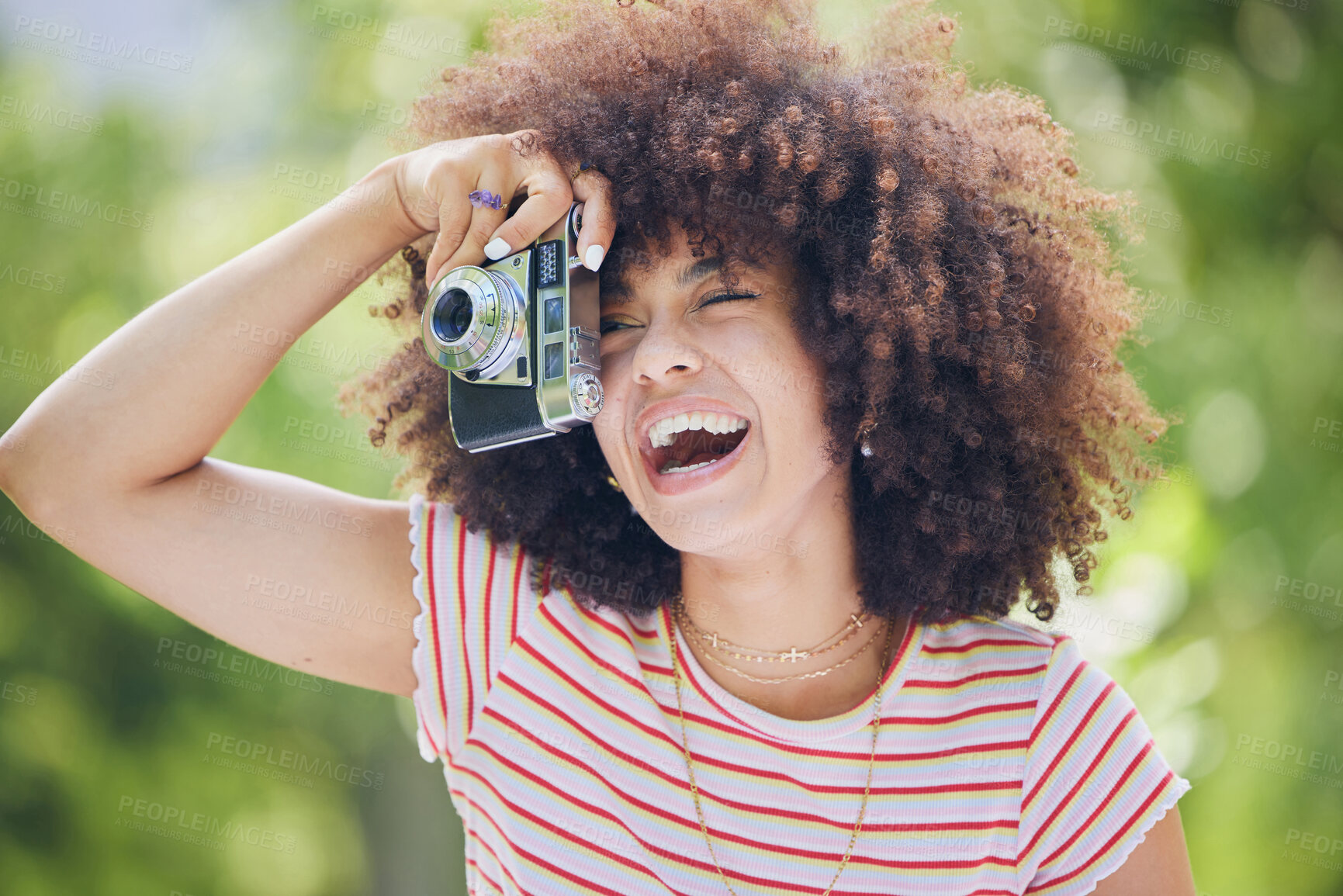 Buy stock photo Nature, afro and black woman with photography camera  taking happy picture memory with retro style. African hipster girl with smile in park using vintage photographer equipment to capture moment.


