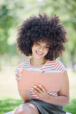 Buy stock photo Book, education and park with a woman student reading on a university or college campus. Study, learning and scholarship with a young female pupil studying from a textbook on a field of grass