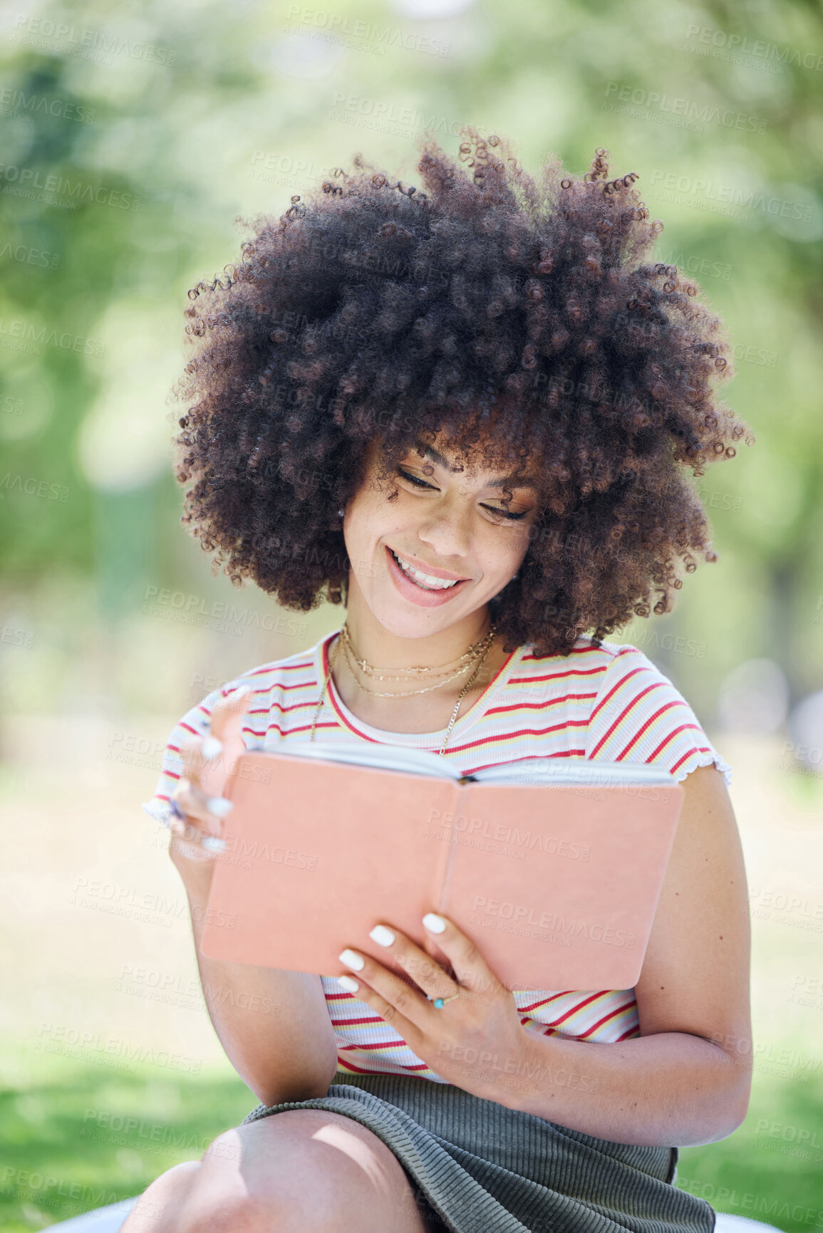 Buy stock photo Book, education and park with a woman student reading on a university or college campus. Study, learning and scholarship with a young female pupil studying from a textbook on a field of grass