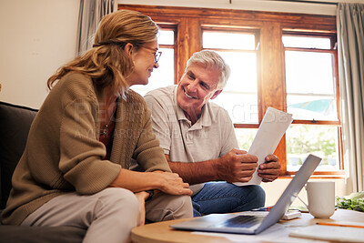 Buy stock photo Laptop, senior couple and retirement planning with documents while sitting on sofa in the living room. Finance, budget and happy elderly man and woman working on pension fund, mortgage bills and debt