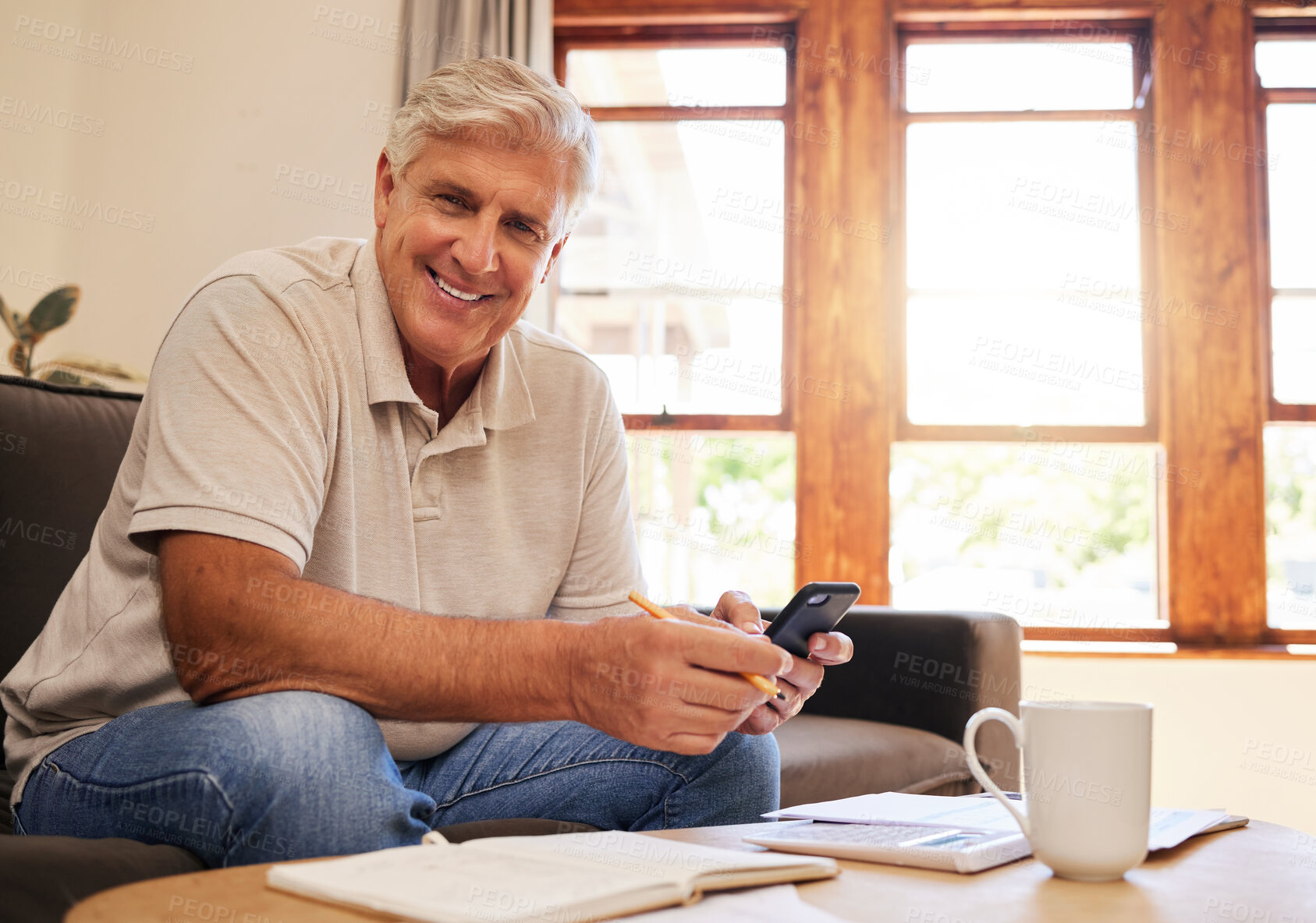 Buy stock photo Paperwork, phone and senior man with pension plan, investments and savings on sofa. Happiness, banking and portrait of elderly guy from Australia in retirement paying mortgage, bills and debt online.