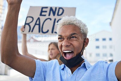 Buy stock photo Racism, covid protest and man with cardboard poster and shout in street with face mask during pandemic. Frustrated human rights activist protesting with sign for equality or justice in city 