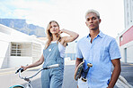 Couple, skateboard and bicycle in portrait for fashion, fun and ride in city during summer. Man, woman and bike outdoor together to skate, cycle and buildings on street with confidence in Cape Town