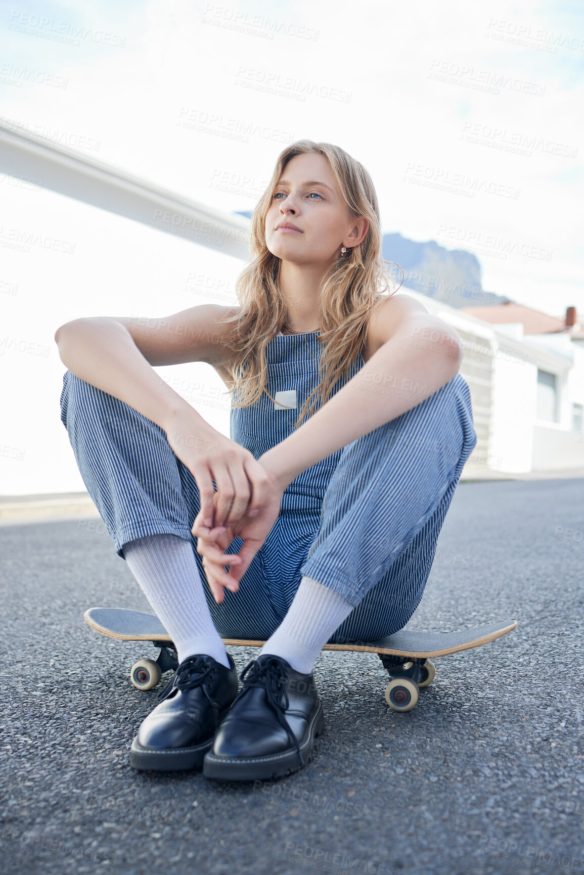 Buy stock photo Hipster skateboard girl, relax on street of city and thinking of a future cool skateboarding skate park. Young urban woman, creative casual fashion and trendy gen z teen sitting in California sun