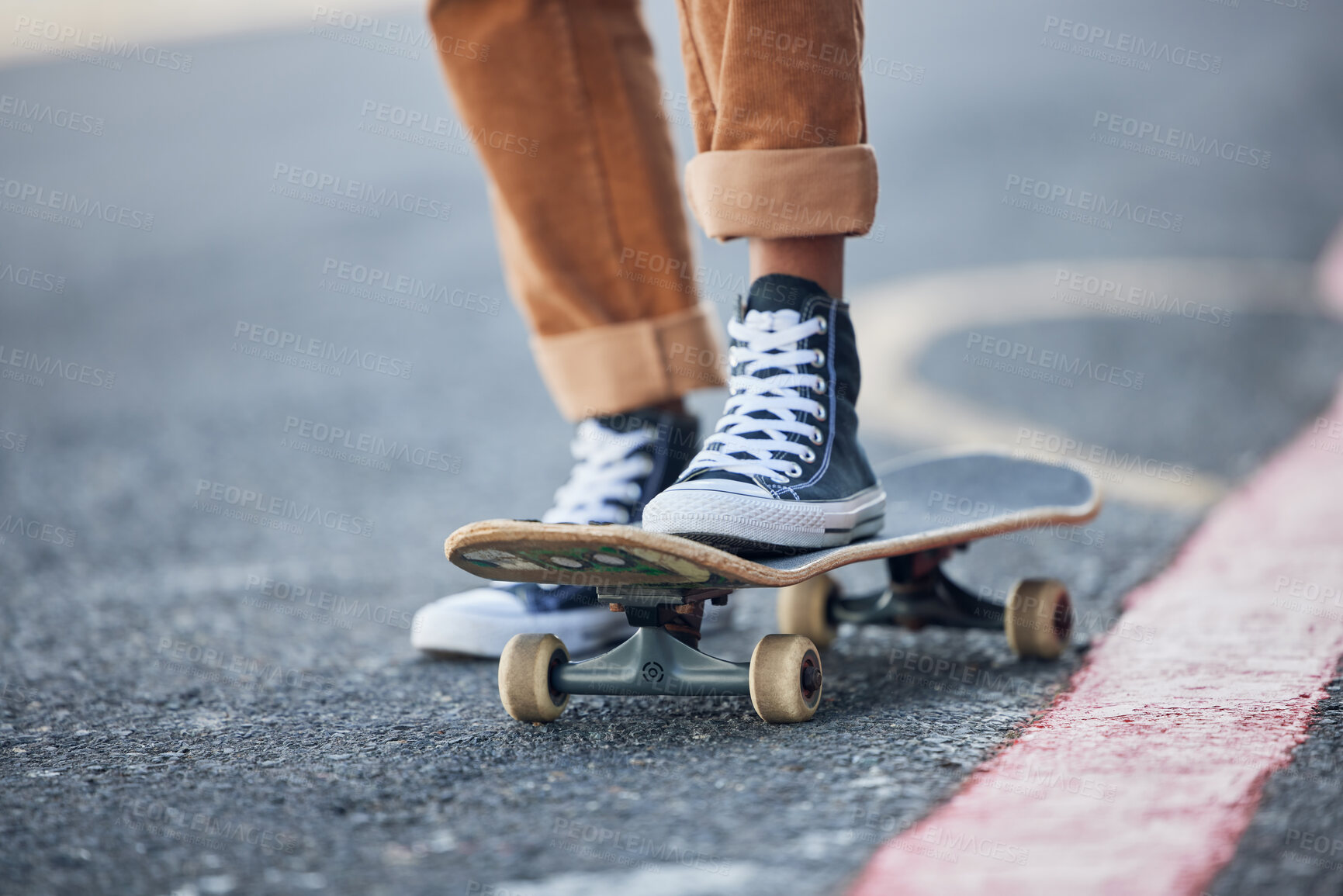 Buy stock photo Street, skateboard and riding shoes travel with balance for outdoor skating leisure practice. Stylish skateboarder man on concrete road for adventure trip with vintage, retro and shoe sneakers.