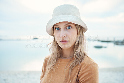 Buy stock photo Hipster woman, holiday at the beach and portrait of calm or relaxing Norway coastal getaway trip. Peaceful summer vacation, seaside sand and young person enjoying time alone at the Oslo ocean harbor 