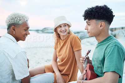 Buy stock photo Guitar, relax and friends on holiday at the beach with music from a musician in Spain during summer. Happy, young and travel people playing ukulele instrument on vacation by sea for peace and calm