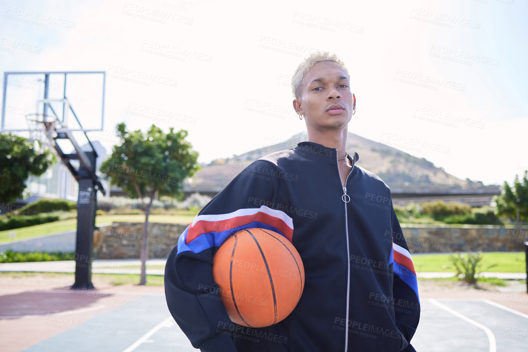 Buy stock photo Basketball, sports court and portrait of man ready for workout, training or game with serious facial expression. Motivation, health and male from Brazil holding ball for sport, fitness or exercise.