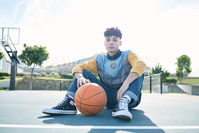 Buy stock photo Man, basketball and training sitting on basketball court for rest, relax or breathe during practice. Basketball player, workout and sports for game in park for sport, fitness and physical health