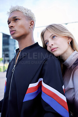 Buy stock photo Couple love, serious and street fashion modern gen z or edgy millennial style in city together. Young man and woman, diverse fashionable friends and cool trendy youth outdoor designer wear lifestyle
