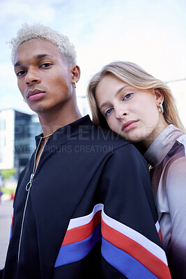Buy stock photo Fashion, youth and portrait of couple in city pose for selfie wearing trendy, stylish and cool clothes. Diversity, freedom and fashion design students on weekend in urban town with serious face