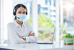 Covid, compliance and healthcare consultant in a call center with ready to help medical clients with insurance. Woman, employee and contact support worker in safety face mask with headset and mic